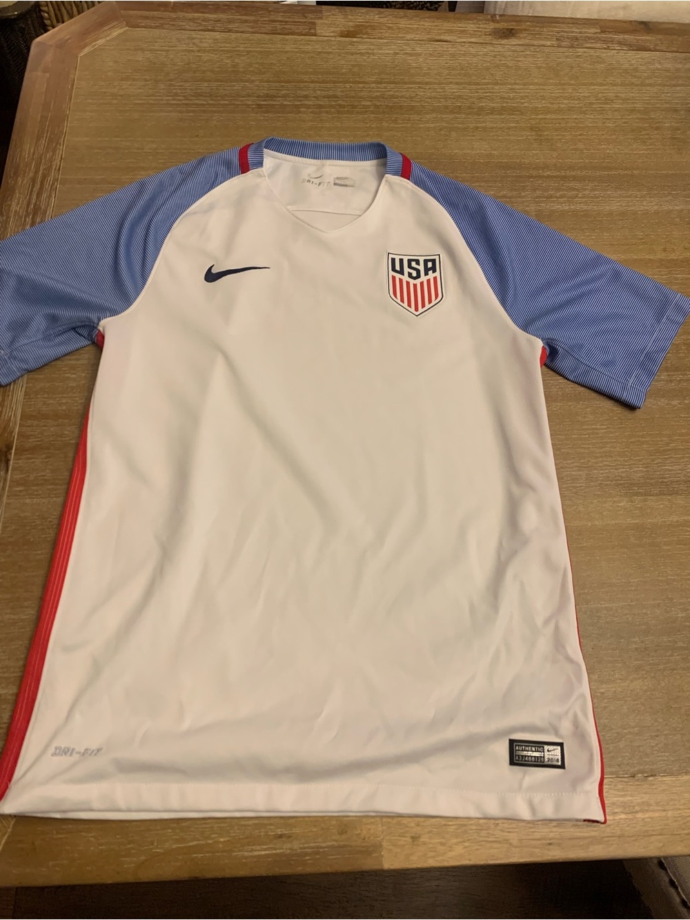 Unisex Nike USA White Soccer Jersey with Blue Sleeves and Red Accents